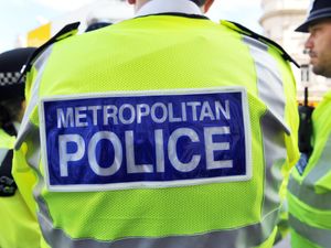 Metropolitan Police officer wearing a high-vis jacket