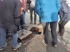 Residents on sewage tour of Shrewsbury lifted the lid on the sewage overflow at Shrewsbury's weir at Sydney Avenue