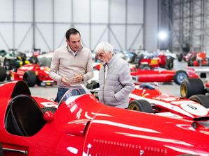 Bernie Ecclestone (right) with his car collection and exclusive high-end car dealer Tom Hartley Jnr