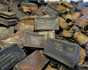 Cases and baskets taken from prisoners at Auschwitz.