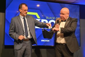 Express & Star editor Mark Drew draws the raffle alongside event host Dicky Dodd