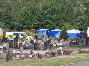 Supporting image for story: Searches continue after human remains found in skip at Tipton Cemetery