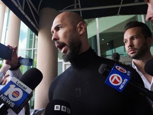 Andrew Tate speaking to the media in Florida