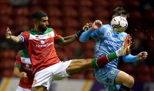 Walsall's Joss Labadie (left) and Forest Green Rovers' Jake Young 