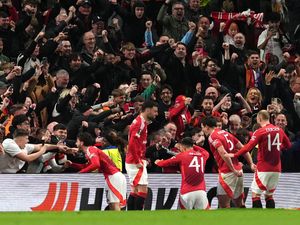 Harry Maguire celebrates the dramatic winner