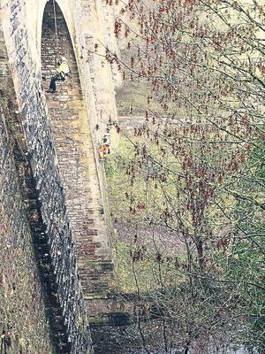 Contractors remove unwanted vegetation from crevices on Chirk Aqueduct