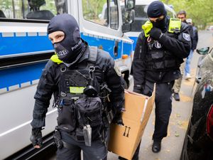 Supporting image for story: German authorities raid 15 properties in probe into climate activist group