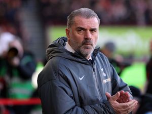 Ange Postecoglou applauds during the game at Brentford