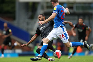 Darragh Lenihan of Blackburn Rovers fouls Matt Phillips of West Bromwich Albion. (AMA)