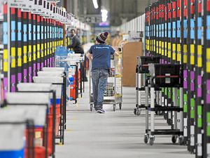 Supporting image for story: Profits down but sales soaring at Amazon