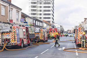 Dozens of firefighters tackled a blaze at the Royale Garden restaurant in West Bromwich High Street, with the road closed for several hours