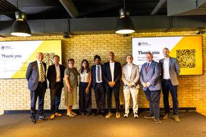 From left: Will Clowes, John Denley, Helene Dearn, Amber Sandhu, Warinder Juss, Karl Henry, Jeff Shi, Councillor Stephen Simkins, Andy McLaren. 