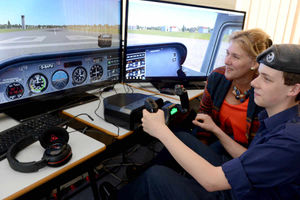 Lynnette Williams sees the flight simulator in action with cadet Daniel Ashton