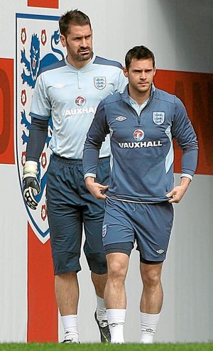 England goalkeeper Scott Carson (left) and Matt Jarvis (right) walk out to a training session at Wembley Stadium,