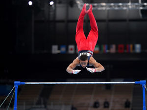 Great Britain's Joe Fraser on the horizontal bar during the Men's All-Around Final at the Ariake Gymnastics Centre on the fifth day of the Tokyo 2020 Olympic Games in Japan. Picture date: Wednesday July 28, 2021. PA Photo. See PA story OLYMPICS Gymnastics. Photo credit should read: Mike Egerton/PA Wire.
RESTRICTIONS: Use subject to restrictions. Editorial use
only, no commercial use without prior consent from rights holder.