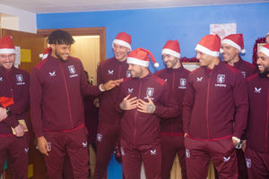 The players were in good spirits, sharing a laugh with people at Acorns