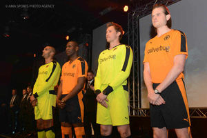 Carl Ikeme, Benik Afobe, Tomasz Kuszczak and Richard Stearman of Wolverhampton Wanderers model the new home kit for the 2015 / 2016 season.