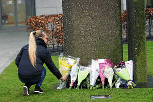 Floral tributes are laid along the Hagley Road in memory of schoolgirl Christina, 16