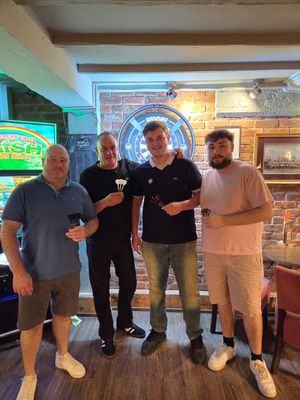 Darts marathon organiser Rob Charlesworth (second from left) and some of the players who will be taking part in the fundraising challenge.