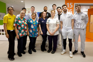 Players from West Bromwich Albion FC with Sandwell and West Birmingham NHS Trust staff.
