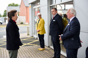 The Princess Royal is greeted by Mr Derek Langford, Landau Trustee Board Member