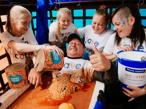 Supporting image for story: Acorns fundraiser bathes in baked beans in 24-hour charity bid 