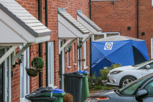 Police and tributes in Robin Close, Rowley Regis