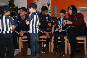 West Bromwich Albion players visit children at Acorns Children's Hospice to give out Christmas presents. Photo: AMA