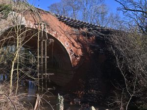 The landslide on the Severn Valley Railway, near to the Astbury Gold Course and Bridgnorth. Half of the edging stones on a bridge have gone aswel as the land. On some pics is local worker: Alex Stevens, he saw the landslide and was the one that called it in to the railway.