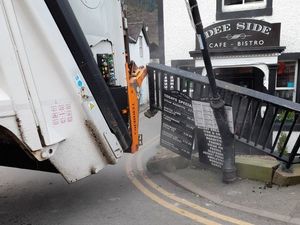 Supporting image for story: Traffic chaos as bin lorry crashes into railings and blocks roads