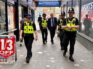 West Midlands Police and Crime Commissioner Simon Foster with officers from Operation Prosper in Walsall. PIC: Gurdip Thandi LDR