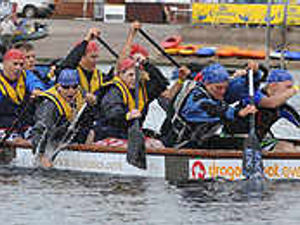 Supporting image for story: Dragons fire up for charity boat race