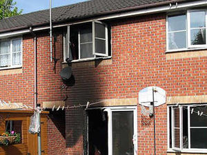 Supporting image for story: Woman jumps from Old Hill home blaze