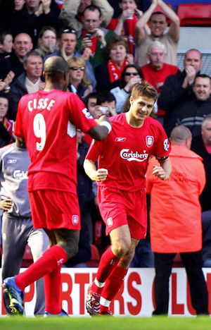 Liverpool's Steven Gerrard (R) celebrates his first goal against Aston Villa