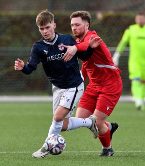 Action from Stafford Town v Stockport Georgians. Joshua Wilson.