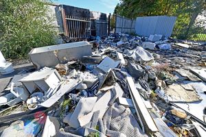 The piles of rubbish.