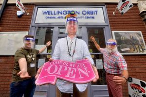 Wellington Orbit. With the sign is: John Abbott, duty manager, and with him is Liam McClelland (far left) and Joerg Niehoegen