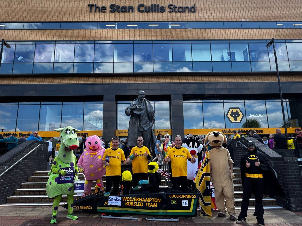 Puff the Bridgnorth Dragon and friends collect thousands and sweat buckets in charity football stadium walk