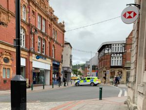 Supporting image for story: Armed police on streets in Newtown drugs swoop