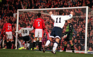 Walsall celebrate as they score against Manchester United