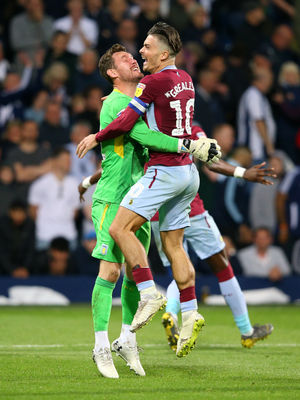 Jed Steer and Jack Grealish celebrate after the former guided Villa to play-off semi-final success after a penalty shootout at rivals Albion. Pic: PA