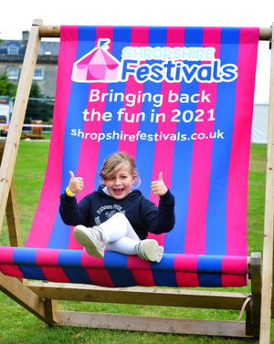 Enjoying Shrewsbury Food Festival, at The Quarry, Shrewsbury, Megan Jarvis, aged 7, of Church Stretton