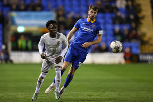 Tom Bloxham of Shrewsbury Town and Vincent Harper of Exeter City (AMA)