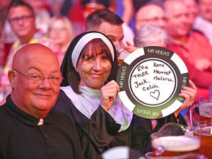 Supporting image for story: Colourful outfits, songs and a celebration of darts as Grand Slam comes 'home' to Wolverhampton