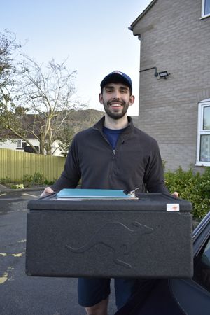 Volunteer Josh Sansom delivering Mayfair Meals
