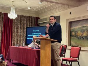 Brecon and Radnorshire Senedd Member James Evans speaking at the public meeting