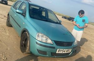 Car fan Callum on the beach. Photo: family