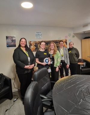 Chloe with her award