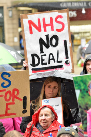 Support Stafford Hospital protesters gather in Market Square, Stafford, to campaign against under funding in the NHS