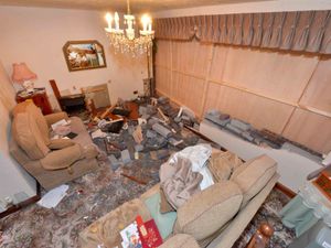 Supporting image for story: Revealed: Shocking damage caused after car ploughs into family home during mass brawl